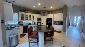 Luxury Villa | Private kitchen | Full-size fridge, microwave, oven, stovetop
