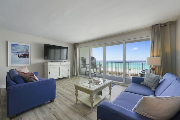 Perfect for relaxing after a beach day, the living room offers comfortable seating and front row views of the Emerald Coast.