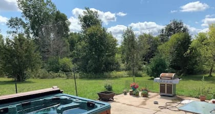 Basement Bedroom Suite in the country with Hot Tub