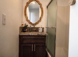 Hair dryer, towels, soap, shampoo