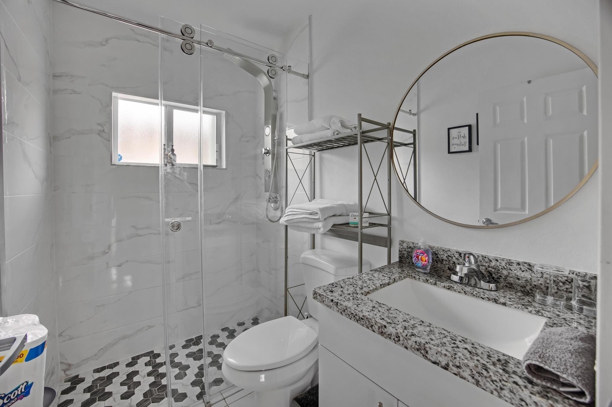 Shower, hair dryer, towels, soap