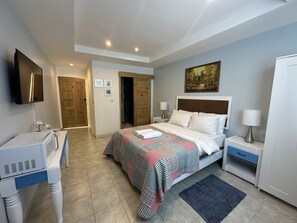 1 bedroom, desk, iron/ironing board, travel crib
