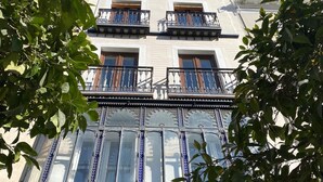 A multi-story building with ornate balconies and large windows. - Julio Cesar Great Apartment Of High Qualities Heart Of Seville (Sevilla)