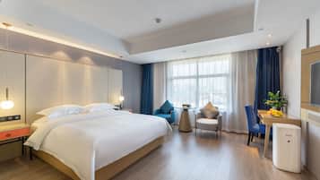 Deluxe Double Room Single Use | Premium bedding, down duvets, minibar, individually decorated