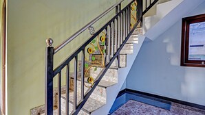 A staircase with decorative railings and patterned tiles. - Hotel O Desa Wisata Alam Gosari (wagos) (Gresik)
