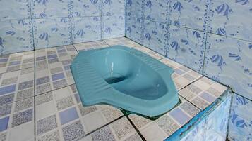 Economy Double Room | Bathroom | Shower, towels, toilet paper