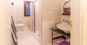 Comfort Room | Bathroom | Shower, rainfall showerhead, hair dryer, bidet