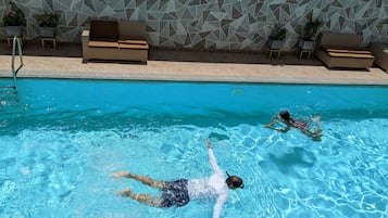 Outdoor pool, open 9:00 AM to 8:00 PM, sun loungers