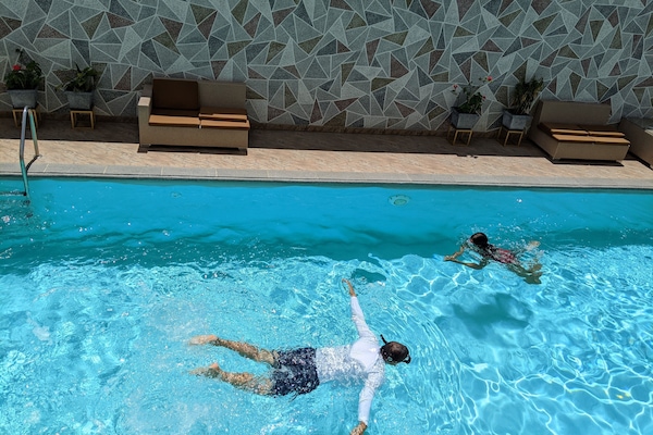 Outdoor pool, open 9:00 AM to 8:00 PM, sun loungers