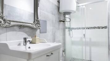 Superior Apartment | Bathroom | Hair dryer, towels, toilet paper