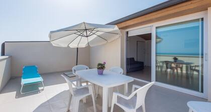 Splendid attic with large veranda.