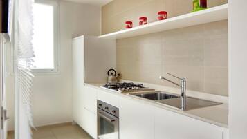 Refrigerador, horno, placa de cocina, lavavajillas