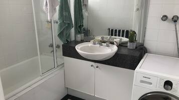 Hair dryer, towels, soap, toilet paper