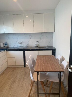 2 Bedrooms Family Suite | Private kitchen | Coffee/tea maker, electric kettle - Masa Hotel Bangkok (Bangkok)