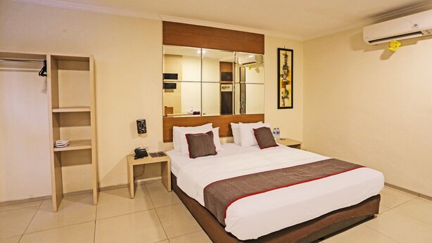 Kamar Double Senior | Wi-Fi gratis dan seprai linen