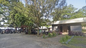 A building with a sign reading "Angkasa Pura | PROFESSIONAL".