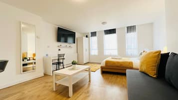 1 bedroom, desk, iron/ironing board, travel crib