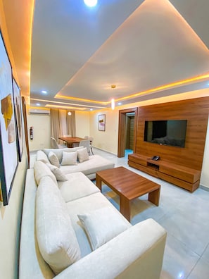 Executive Cabin | Living area | 40-inch LED TV with cable channels, TV - PLUSH HOTEL (Abuja)