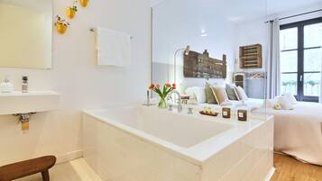 Bathtub, hair dryer, towels