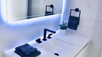 Bathtub, hair dryer, towels