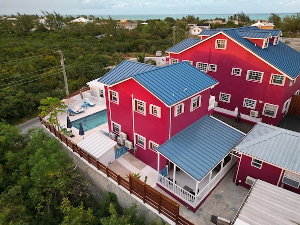 Exterior - Forget your worries in this serene space. Pool view, top floor. Privacy gate. (Blue Hills)