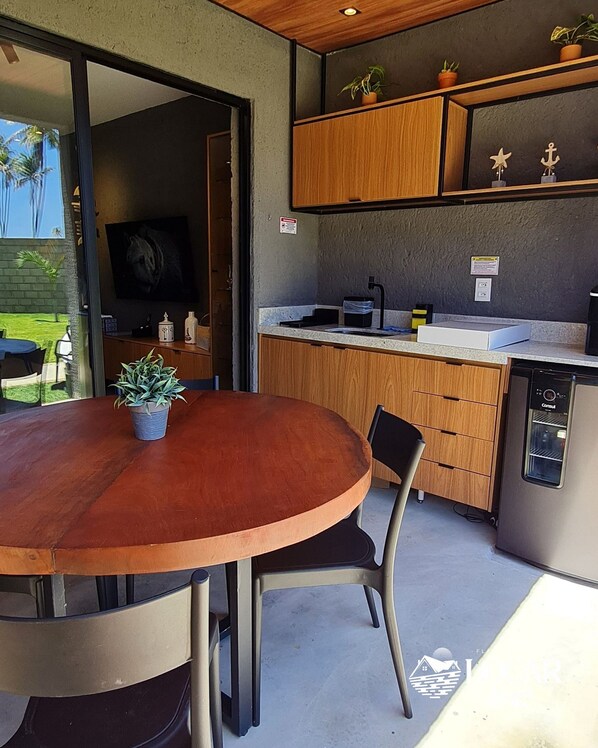 Apartamento | Restaurante al aire libre