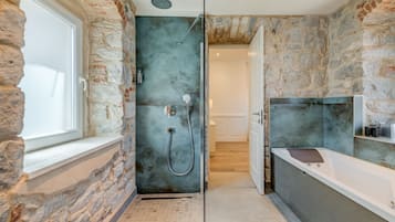 Deluxe Double Room | Bathroom | Shower, rainfall showerhead, hair dryer, heated floors