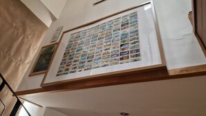 A framed collage of photographs on a wall. - Fully Detached Cottage House Loddington Kettering (Kettering)