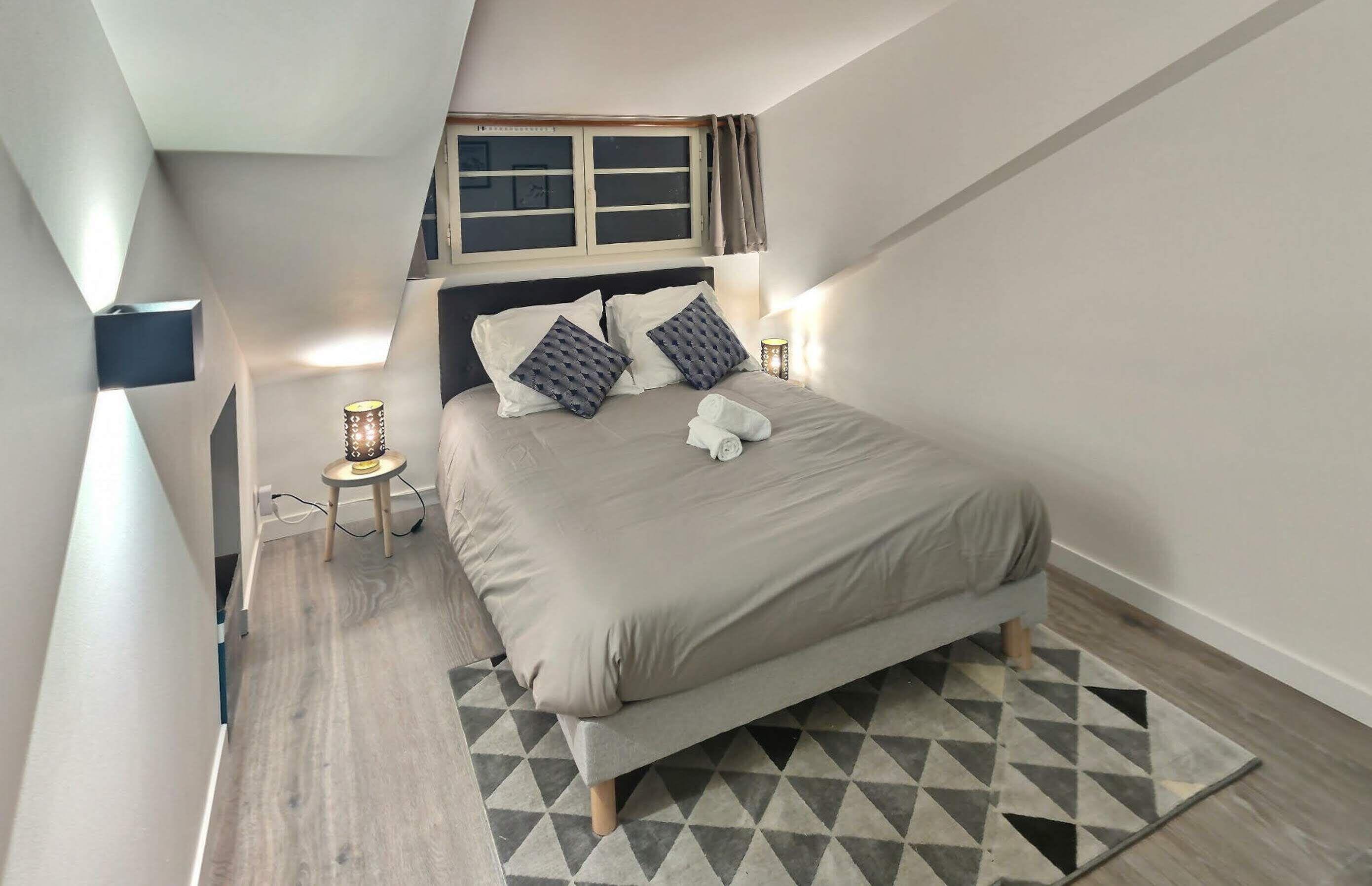 1 bedroom, desk, iron/ironing board, travel crib