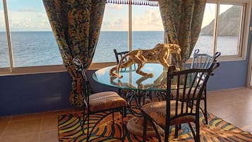 Deluxe Studio Suite | Living area | 42-inch Smart TV with satellite channels, TV, Netflix