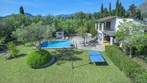 A house with a swimming pool, a tennis court, and a garden. - Ca'n Puput - Two Bedroom Villa, Sleeps 4 (Mallorca)