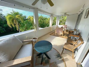 Outdoor dining - Chic Cali-Inspired Condo On Canal w/ Pool (Bonita Springs)