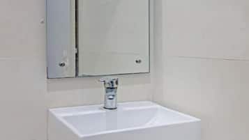 Shower, rainfall showerhead, towels, toilet paper