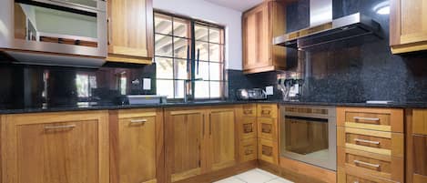 Family Chalet | Private kitchen | Full-sized fridge, microwave, oven, dishwasher