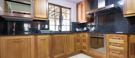 Family Chalet | Private kitchen | Full-size fridge, microwave, oven, dishwasher