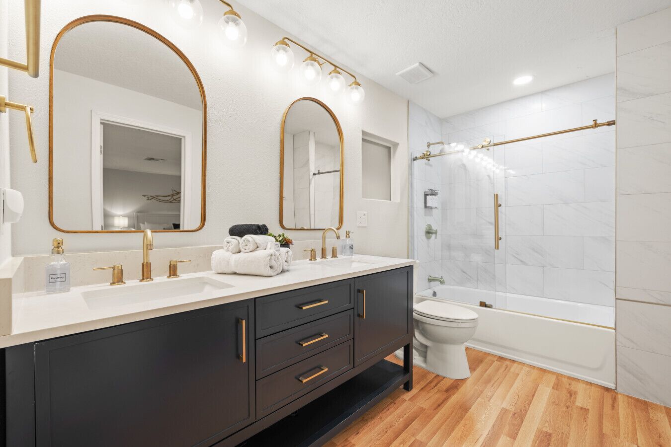 Bathroom #4, ensuite to Bedroom #4, tub/shower, 2 sinks and storage