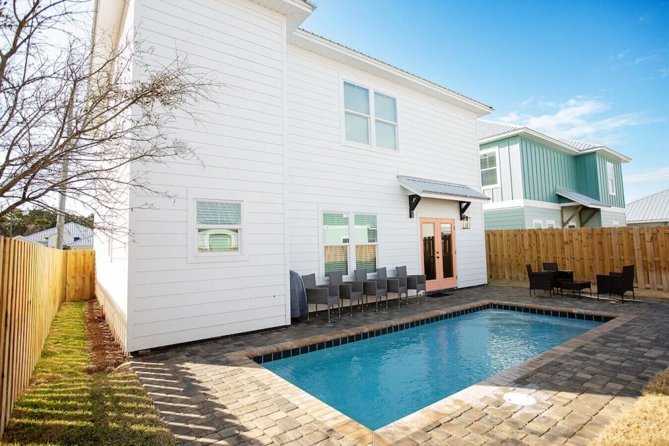 New build, trendy pet-friendly home west PCB with private pool, central to beach, shopping & entertainment!