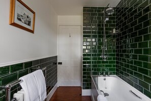 Bathtub, hair dryer, towels