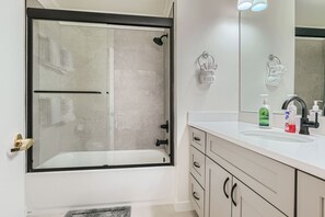 Shower, towels, soap, shampoo