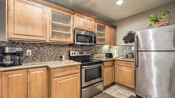 Fridge, microwave, stovetop, coffee/tea maker