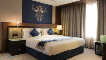 Suite – executive | Safe på rommet, strykejern/-brett, wi-fi (inkludert) og sengetøy