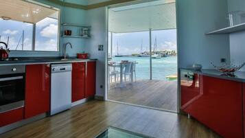 Comfort Villa | Private kitchen | Full-size fridge, oven, stovetop, cookware/dishes/utensils