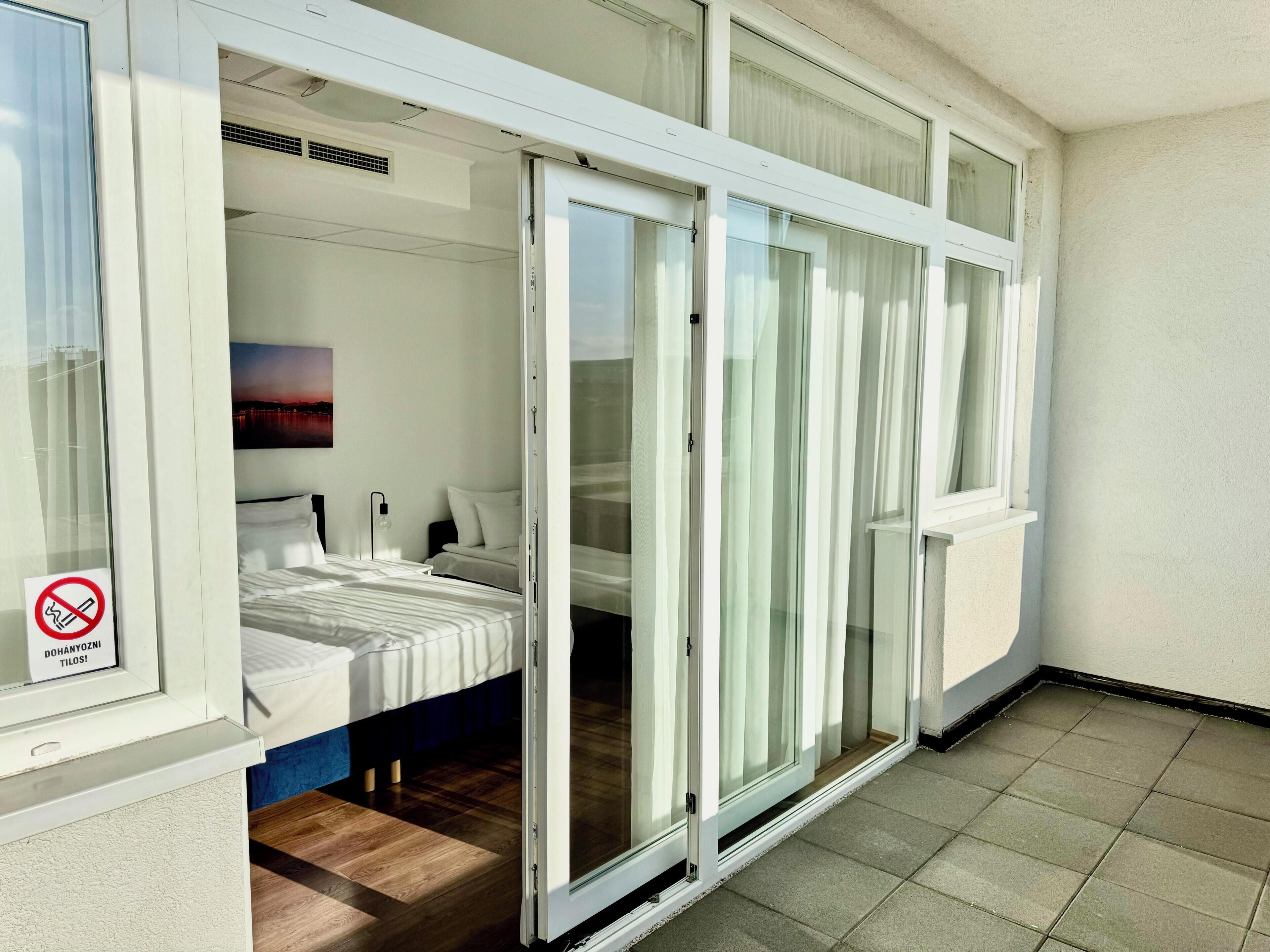 Triple Room, Balcony | Desk, laptop workspace, free WiFi, bed sheets