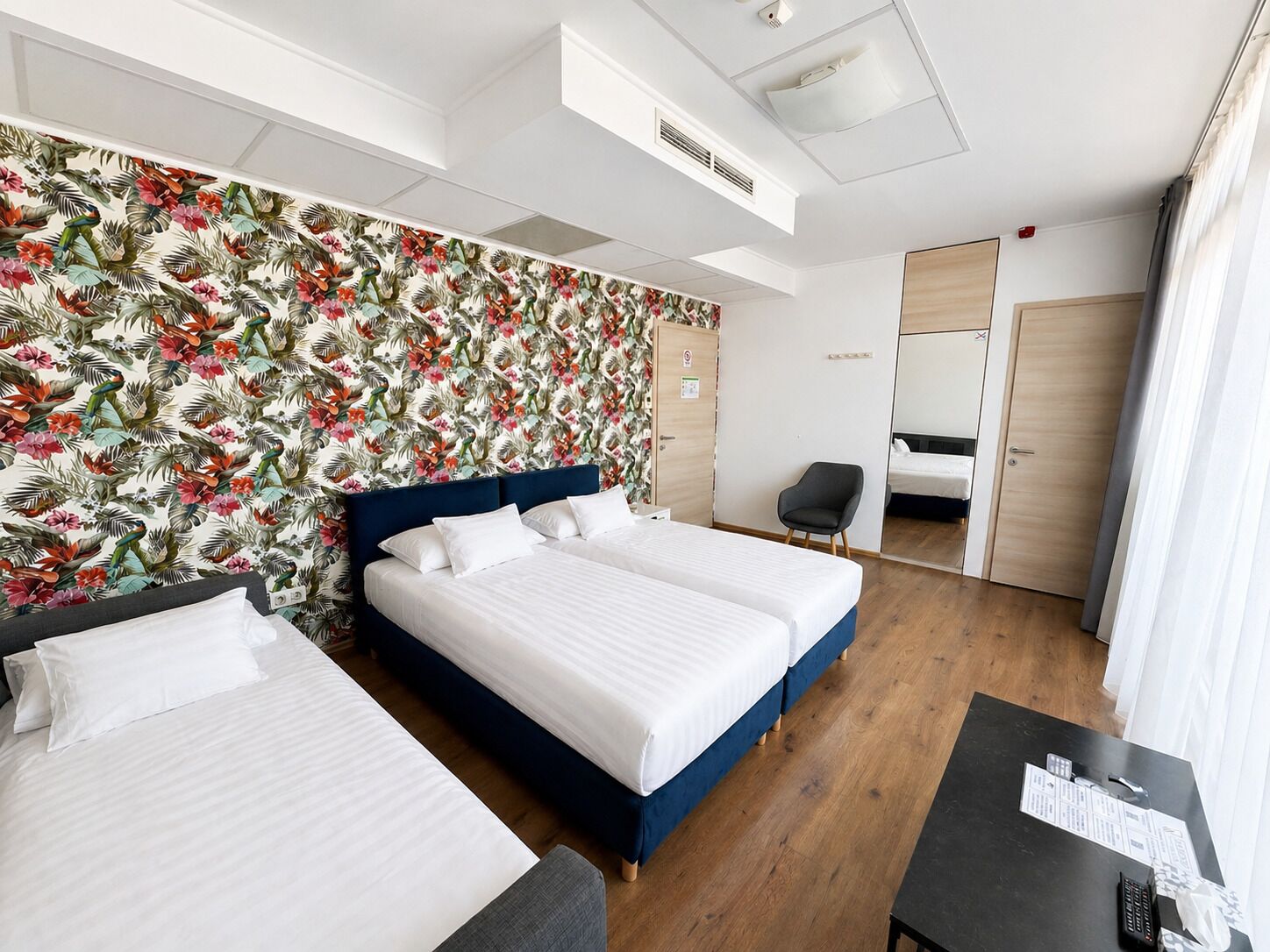Triple Room, Balcony | Desk, laptop workspace, free WiFi, bed sheets