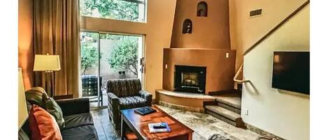 Flat-screen TV, fireplace