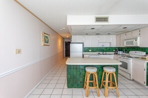 Condo, 2 Bedrooms | Private kitchen | Fridge, oven, coffee/tea maker, toaster