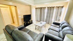 Condo, 2 Bedrooms | Living area - Spectacular 2 Bedroom Condo on Sandy Beach at Las Palmas Resort B-104 2 Condo by RedAwning (Puerto Peñasco)