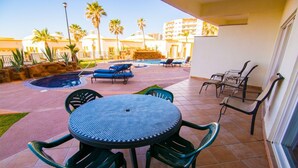 Condo, 2 Bedrooms | Outdoor dining - Spectacular 2 Bedroom Condo on Sandy Beach at Las Palmas Resort B-104 2 Condo by RedAwning (Puerto Peñasco)