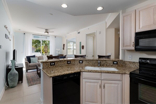 Condo, 2 Bedrooms | Private kitchen | Fridge, oven, coffee/tea maker - ~the Bonita Paddle 2/2~ Your Home Away From Home In Paradise 2 Bedroom Condo by RedAwning (Bonita Springs)