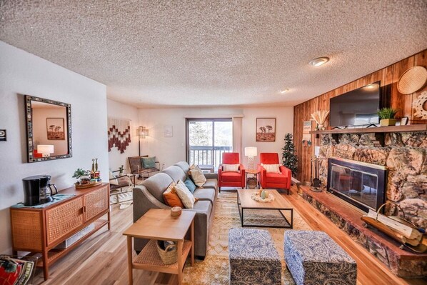 Smart TV, fireplace, books